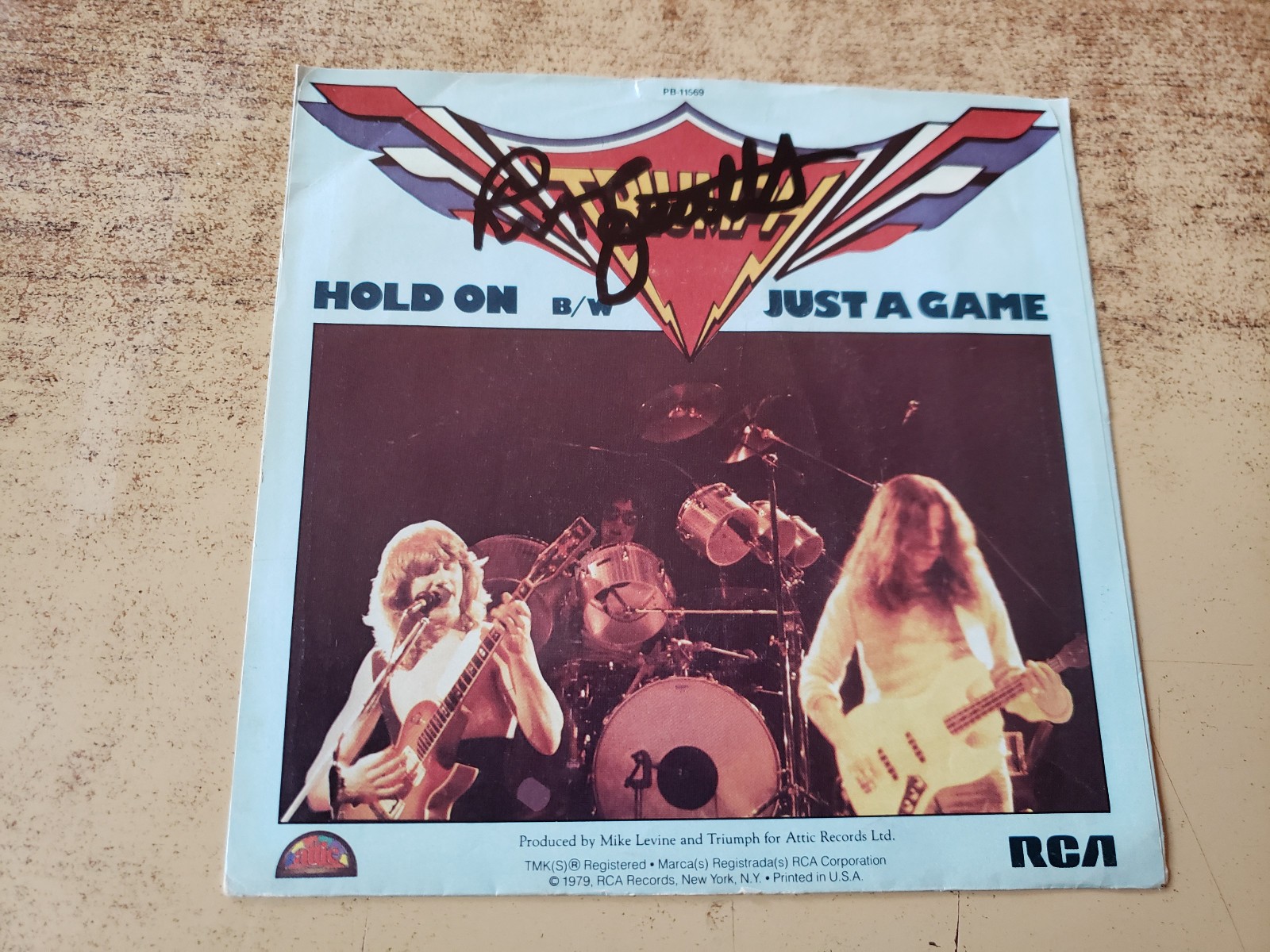 rik emmett hand signed 1970s vg+ Triumph Hold On/ Just A Game sleeve only 45