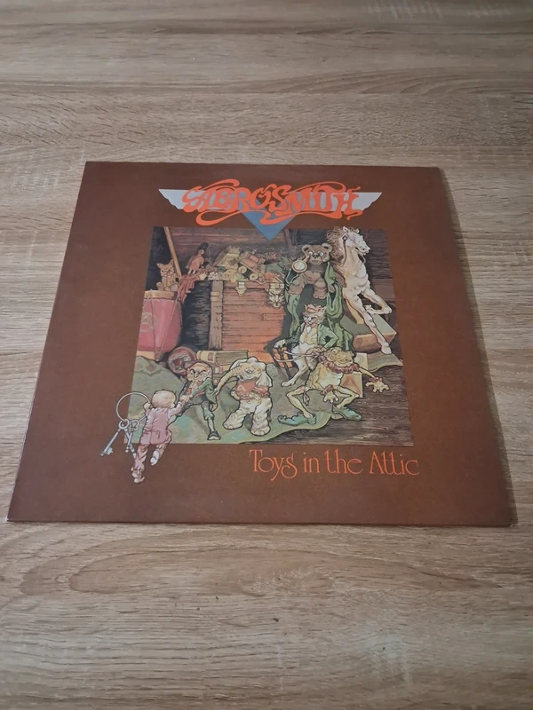 Vinyl aerosmith toys in the attic