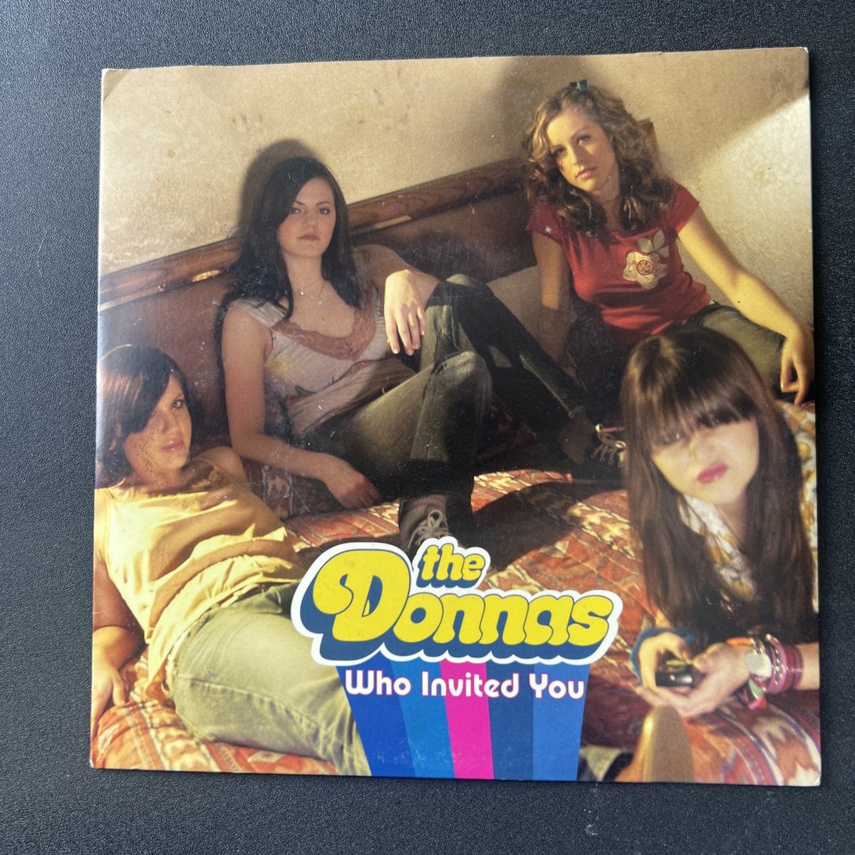 The DONNAS Who Invited You / Mama's Boy 45 7" single 2003 UK