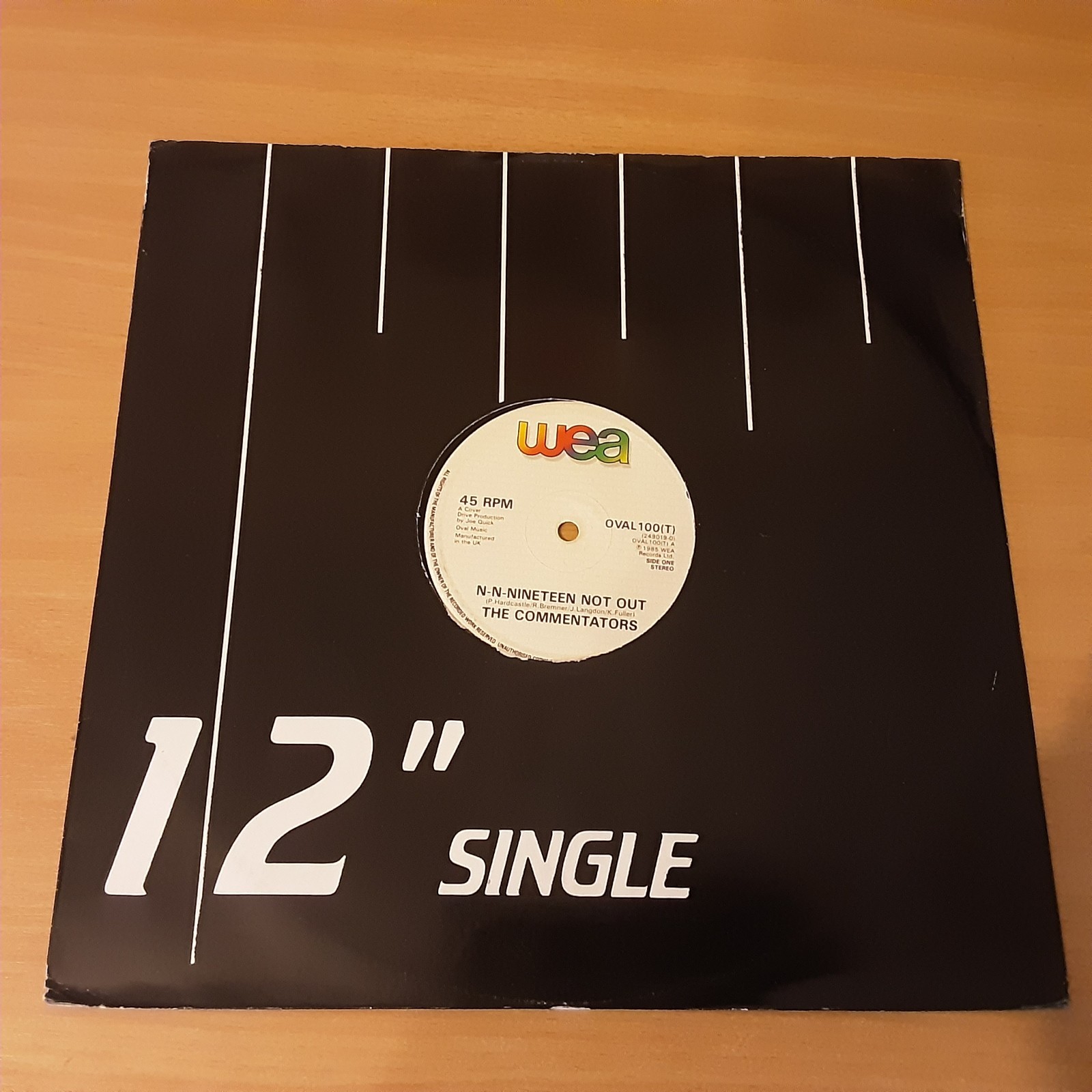 12" Single - The Commentators, N-N-Nineteen Not Out, 1985, WEA (OVAL 100 (T))