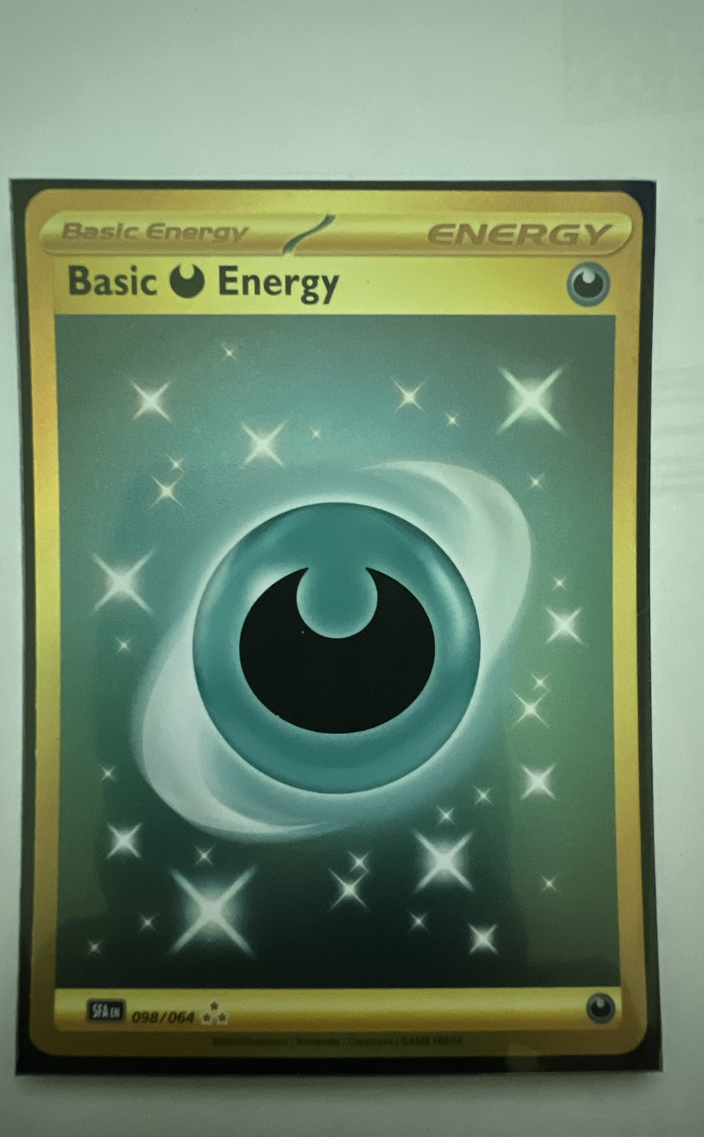 Basic Darkness Energy 098/064 Sv: Holo Favola Avvolta
