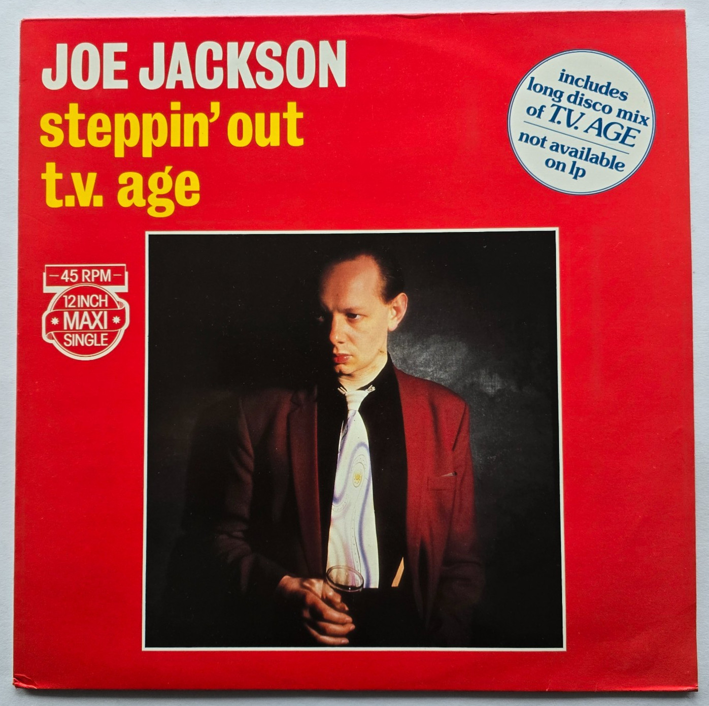 Joe Jackson – Steppin' Out / T.V. Age (Vinyl, 1983), 12" Maxi,sehr gut (VG+++)