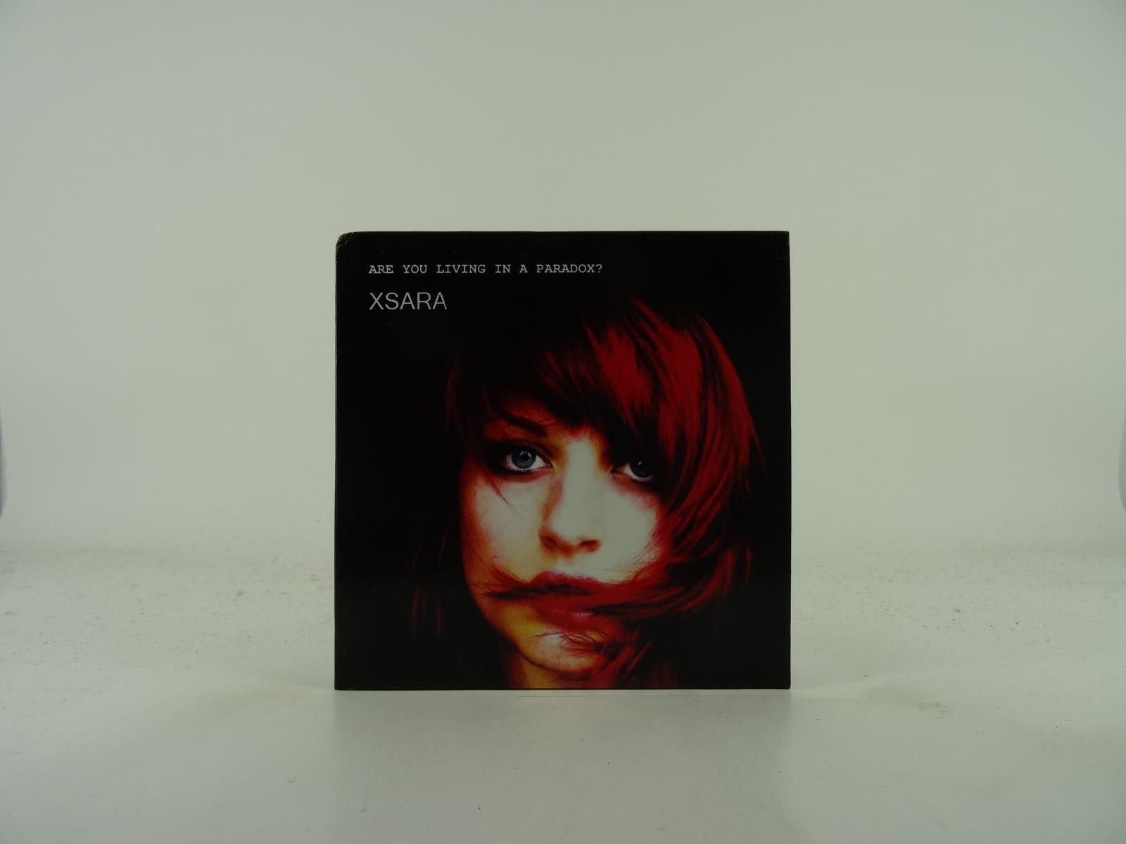 XSARA ARE YOU LIVING IN A PARADOX (182) 6 Track Promo CD Album including Card Sl