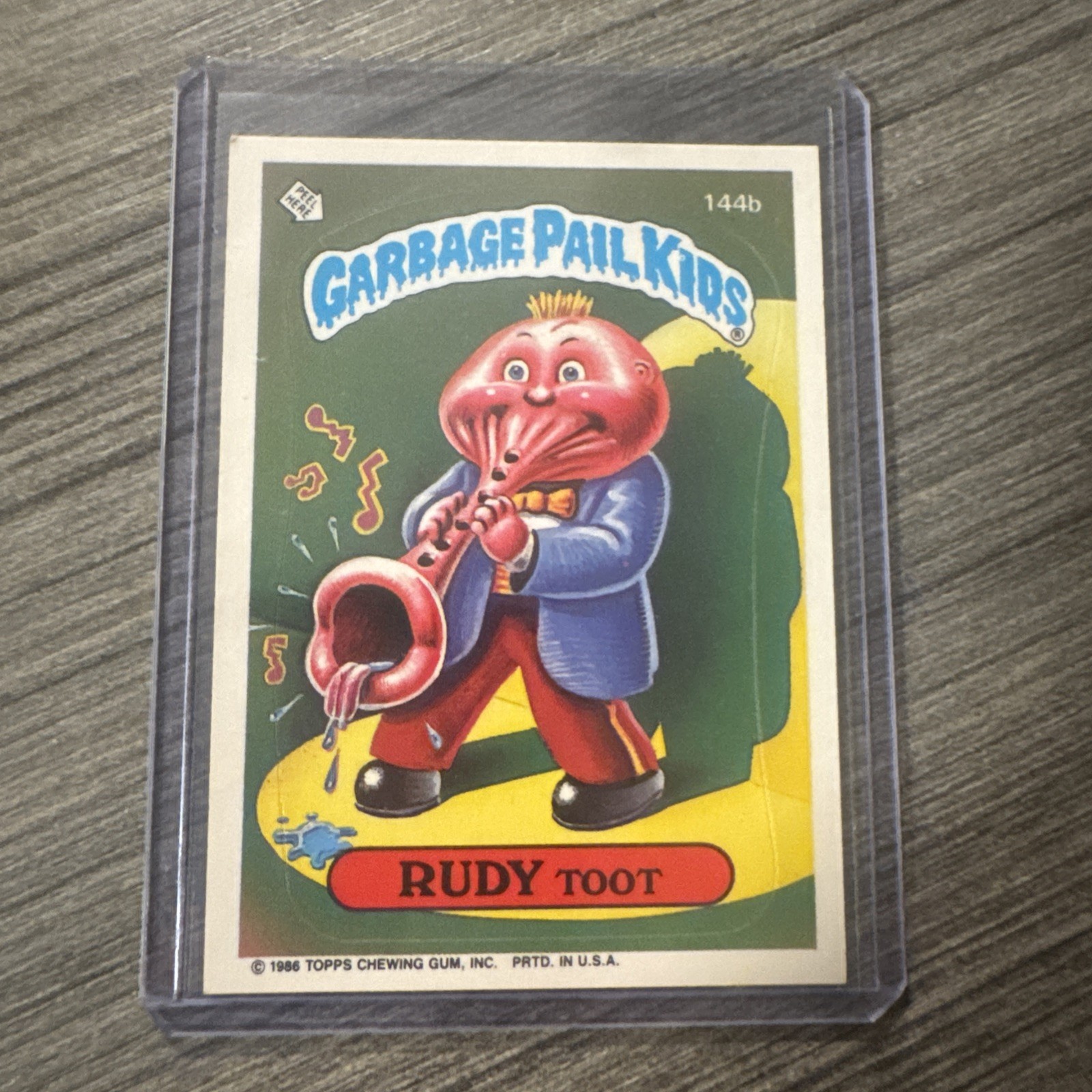 Carta adesiva Topps Garbage Pail Kids serie 4 Rudy Toot 144b 1986 GPK vintage