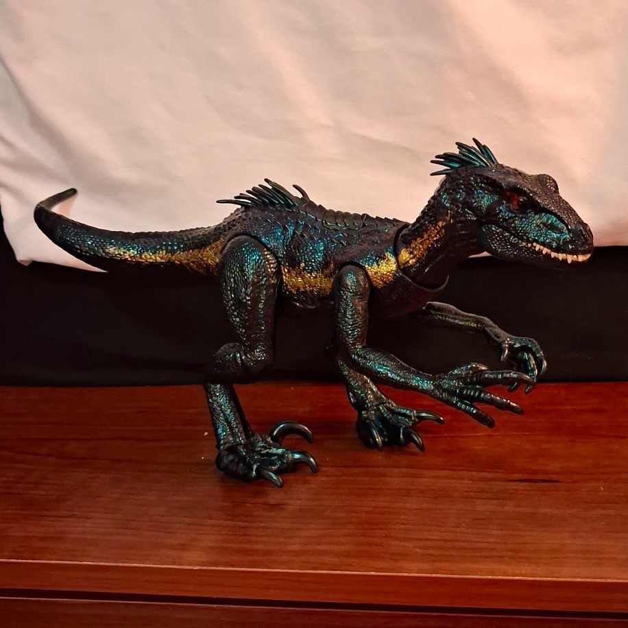 jurassic park Velociraptor dinosauro action figure nero blu oro 