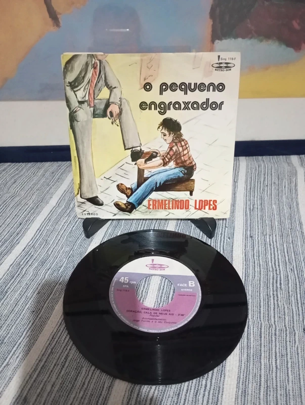 Single. O pequeno Engraxador