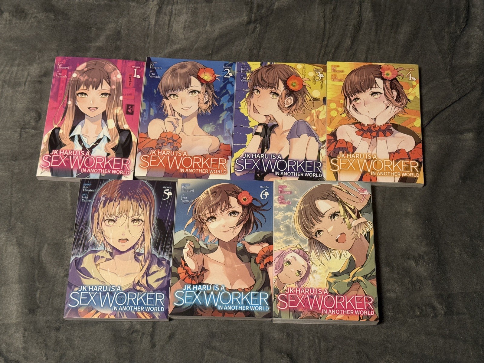 JK Haru is a Sex Worker in Another World Vols 1-7 (Manga, leggere una volta, brossura)