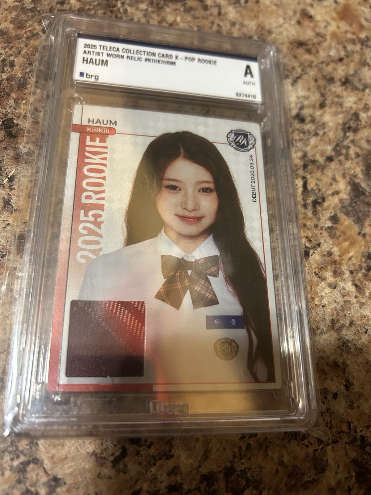 2025 K-POP Teleca KiiiKiii Haum Rookie Patch Artista Reliquia BRG Autentica