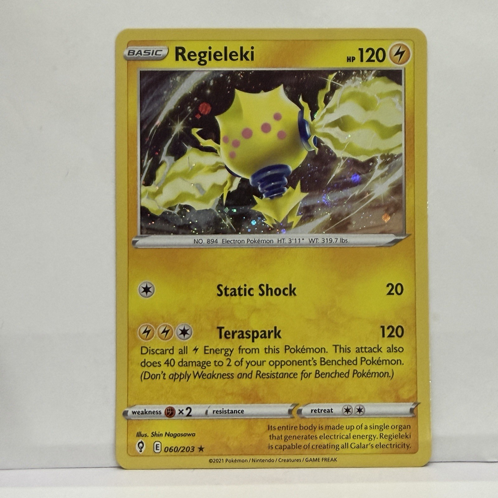 COSMOS HOLO 🌀 SWIRL Regieleki 060/203 - Pokemon Evolving Skies 060/203 NM