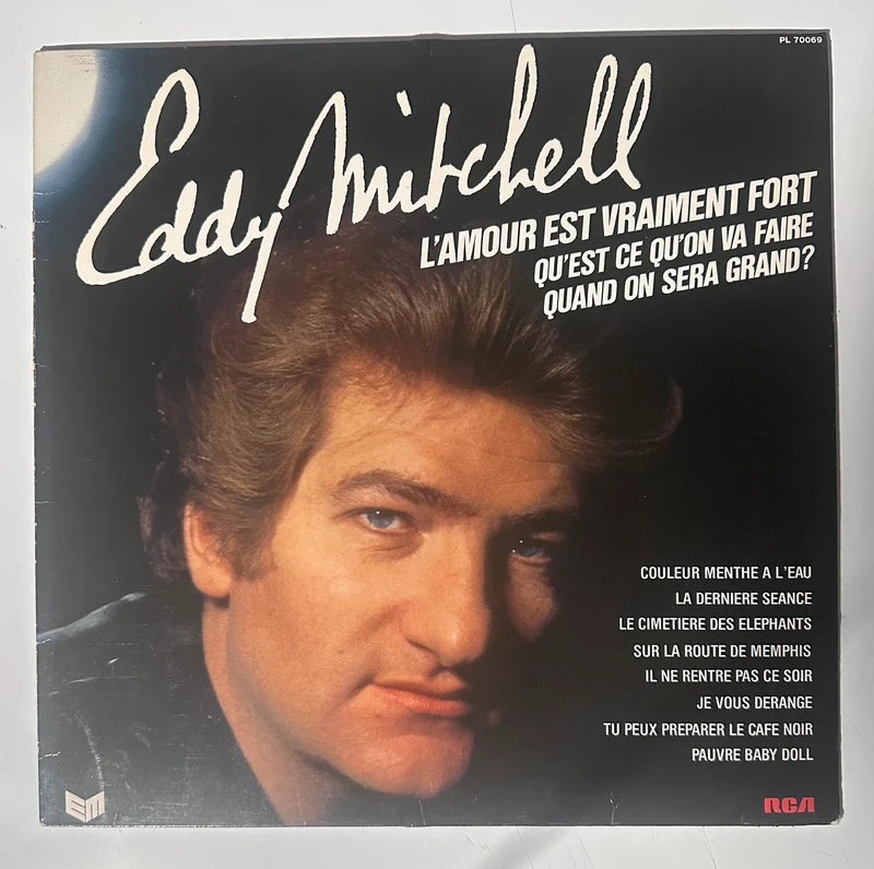 Vinyle 33t Eddy Mitchell - L'amour est vraiment fort (1983)