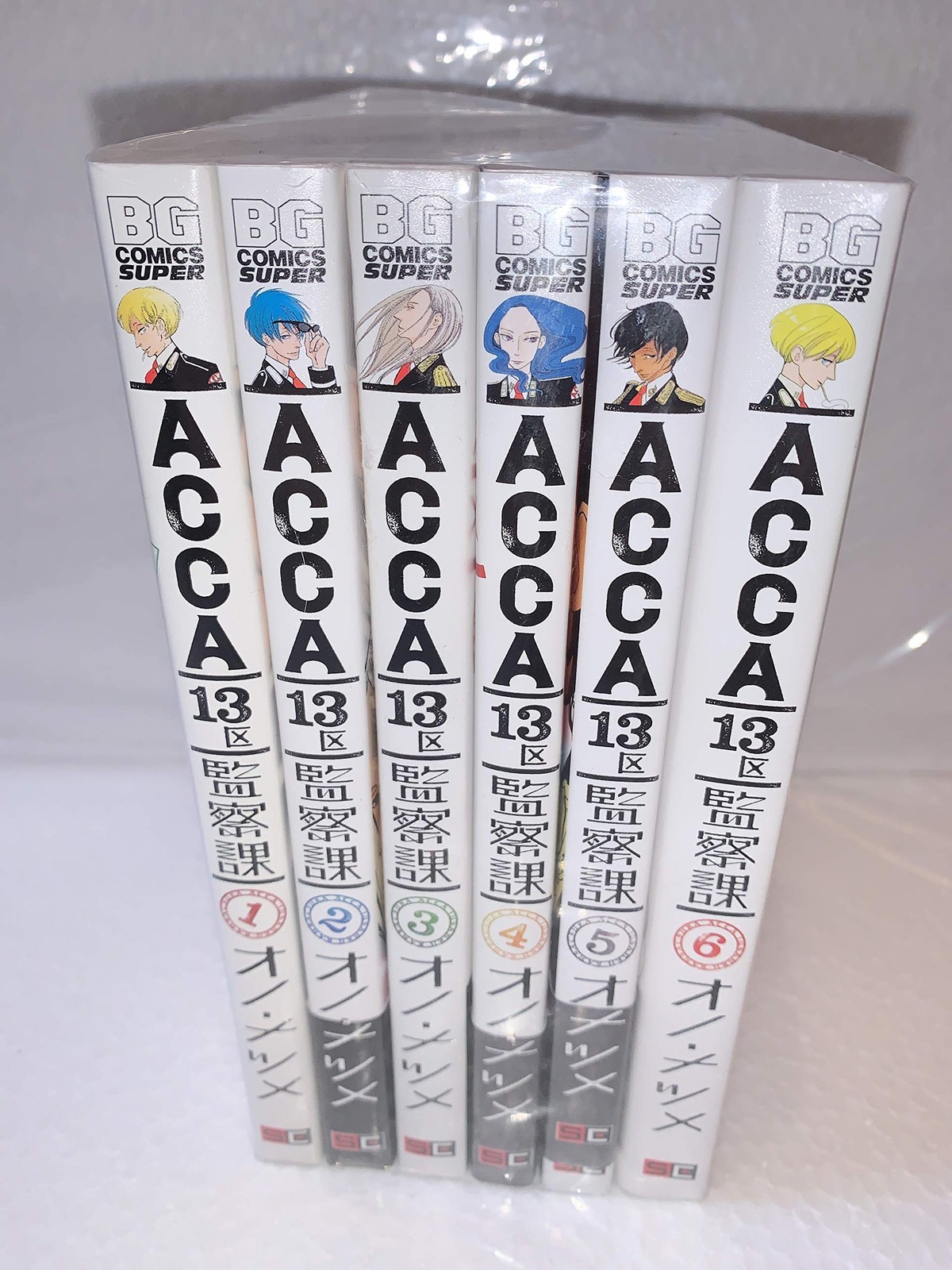 Square Enix ACCA 13th District Inspection Department Comic set completo di...