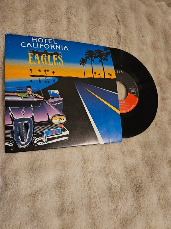 Disque Vinyle 45T - Eagles - Hotel California / New Kid In Town (Classic Rock / Pop Rock)
