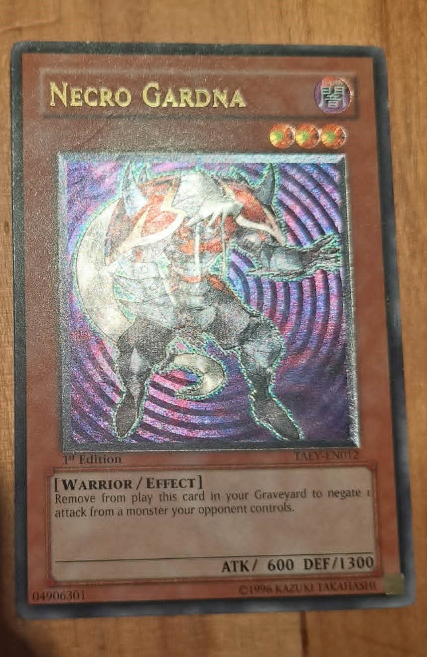 Necro Gardna - TAEV-EN012 - Ultimate Rare - 1st Edition NM yugioh