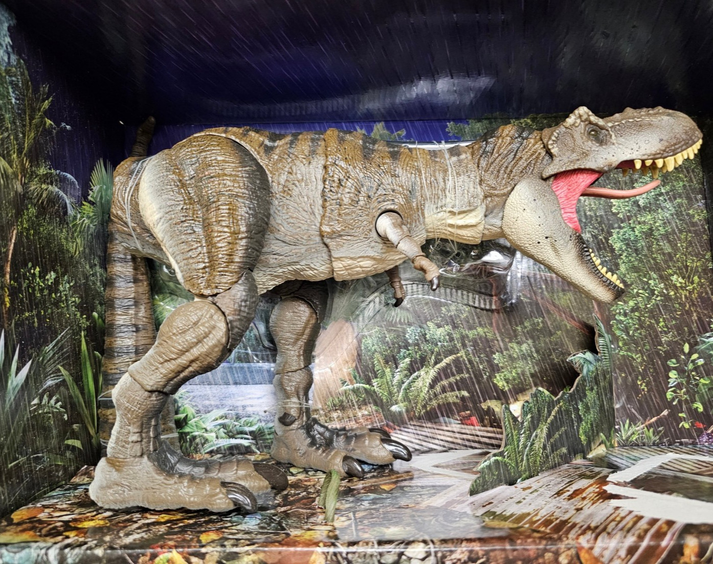 Collezione Jurassic World Hammond Tyrannosaurus Rex Outhouse Chaos Esclusiva