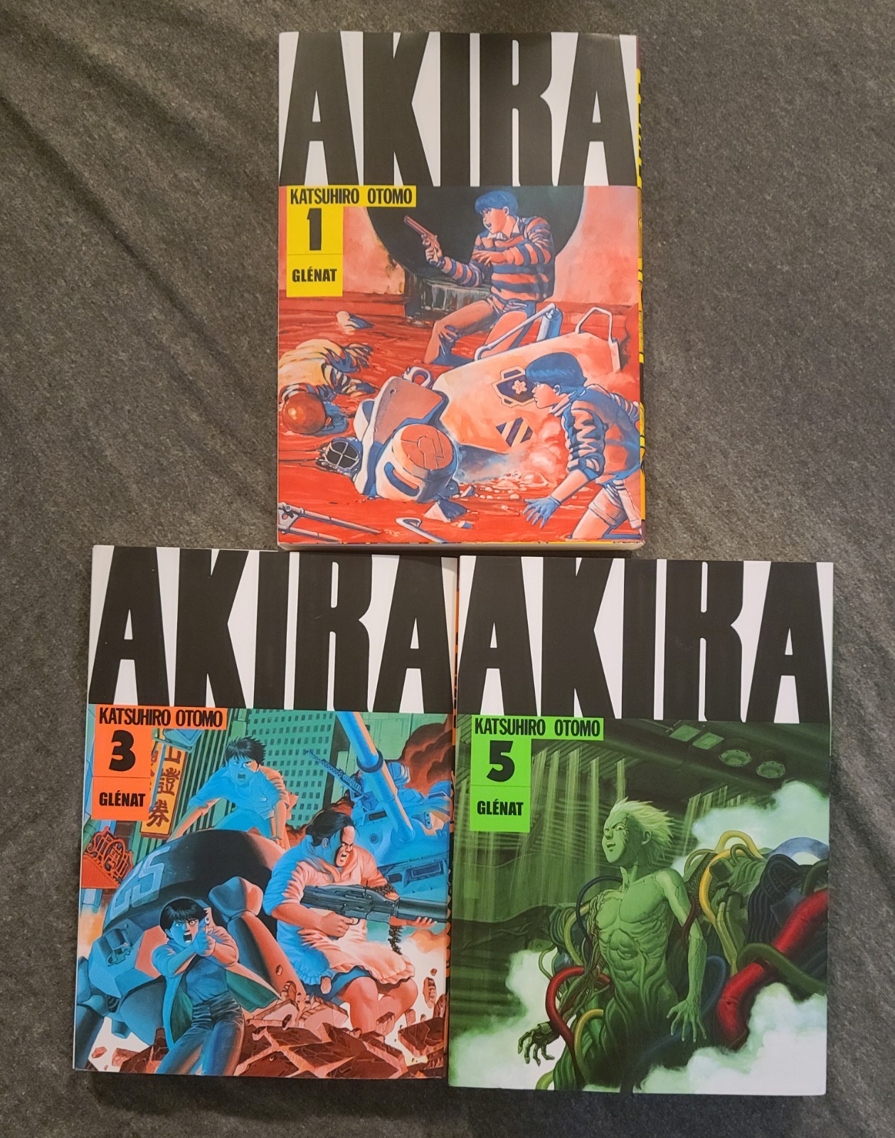 Akira, Vol. 1, 3, and 5 Paperback – Illustrated by Katsuhiro Otomo