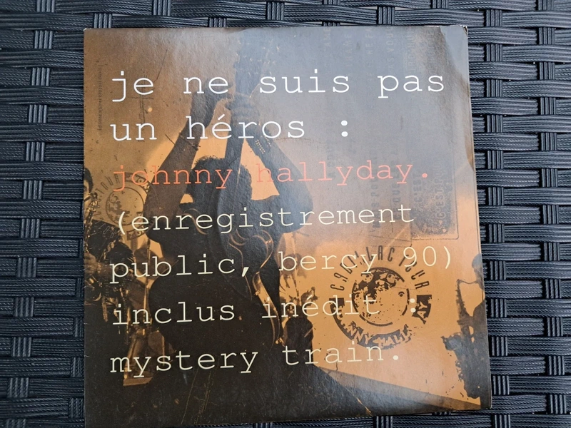 Vinyle , disque 45 tours Johnny Hallyday : Je ne suis pas.un Héros + Mystery Train , Bercy 90