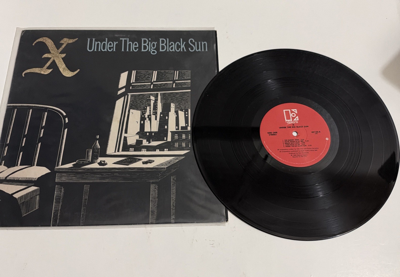 X -- Under The Big Black Sun -- Elektra – 9 60150-1, July 1982 release,  VG