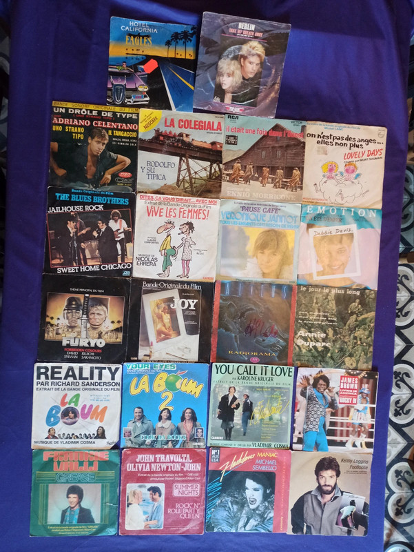 Lot de 22 Disques vinyles 45trs de musiques de films cultes des années 80