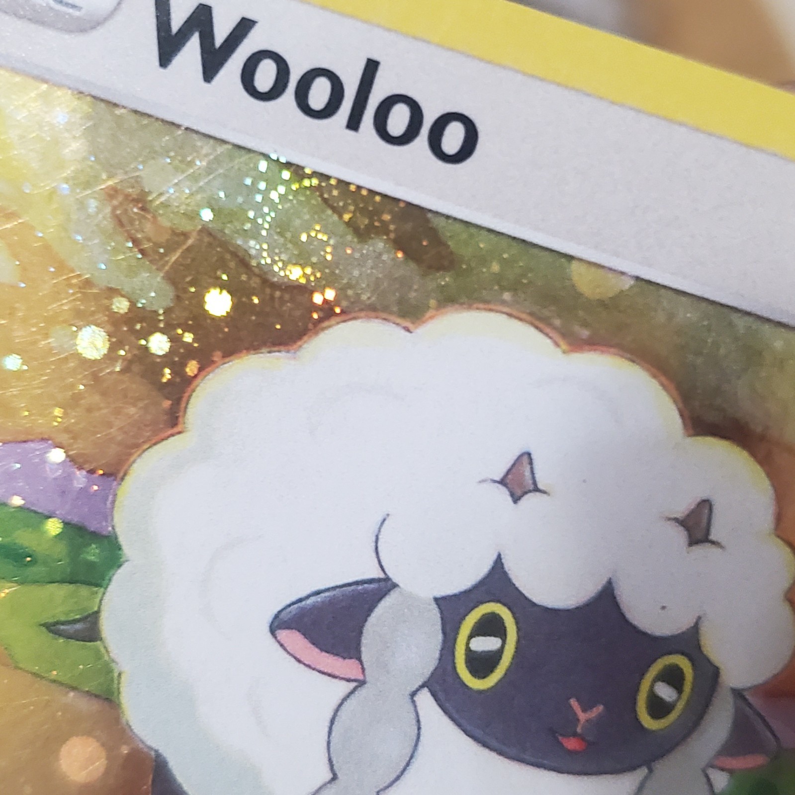 Wooloo 222/264 Holo SWIRL 🌀. Fusion Strike card. cosmos holo pattern.