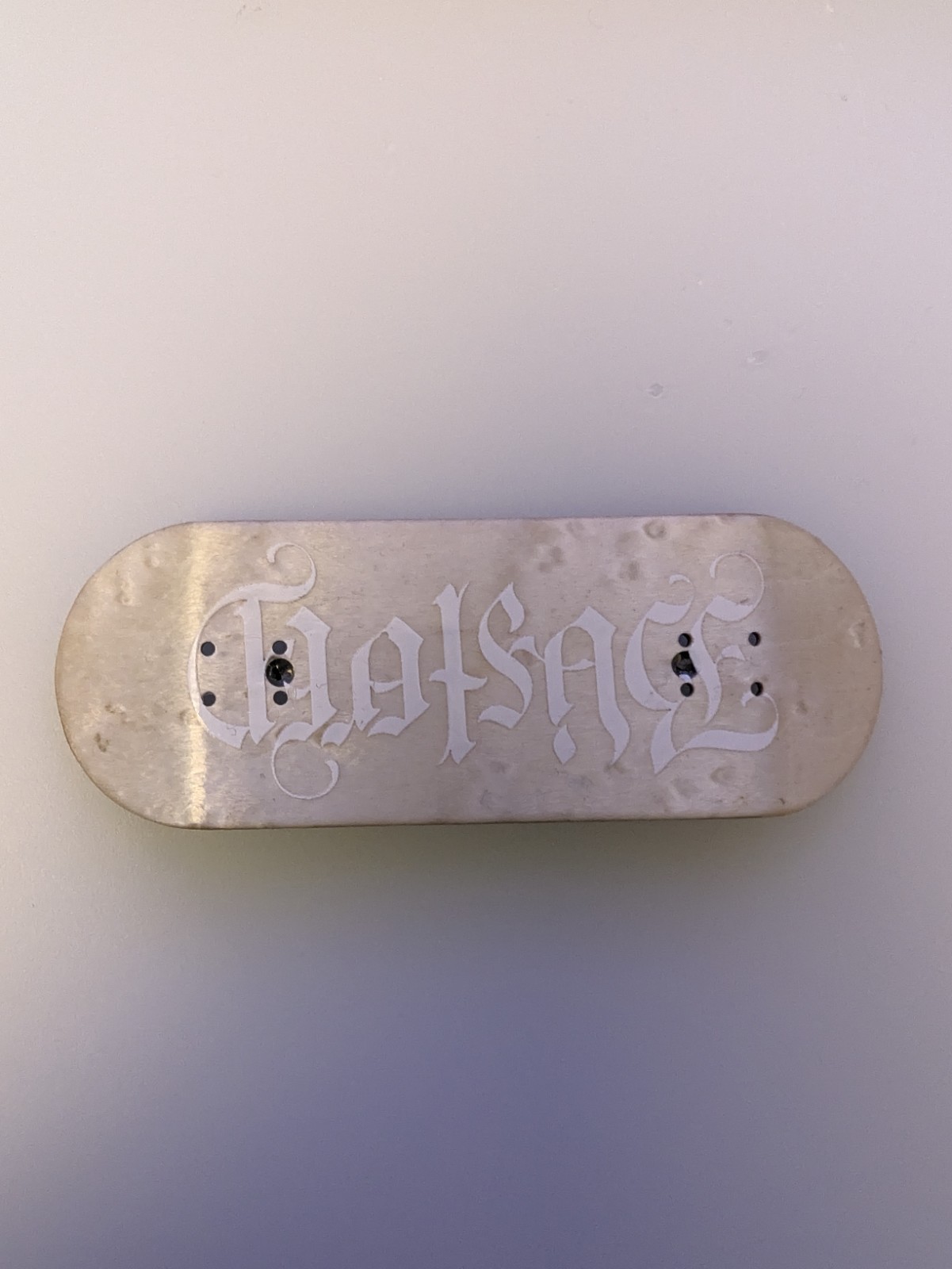 Flatface Fingerboard G16 33.6mm Blistered Ambigram graphic 