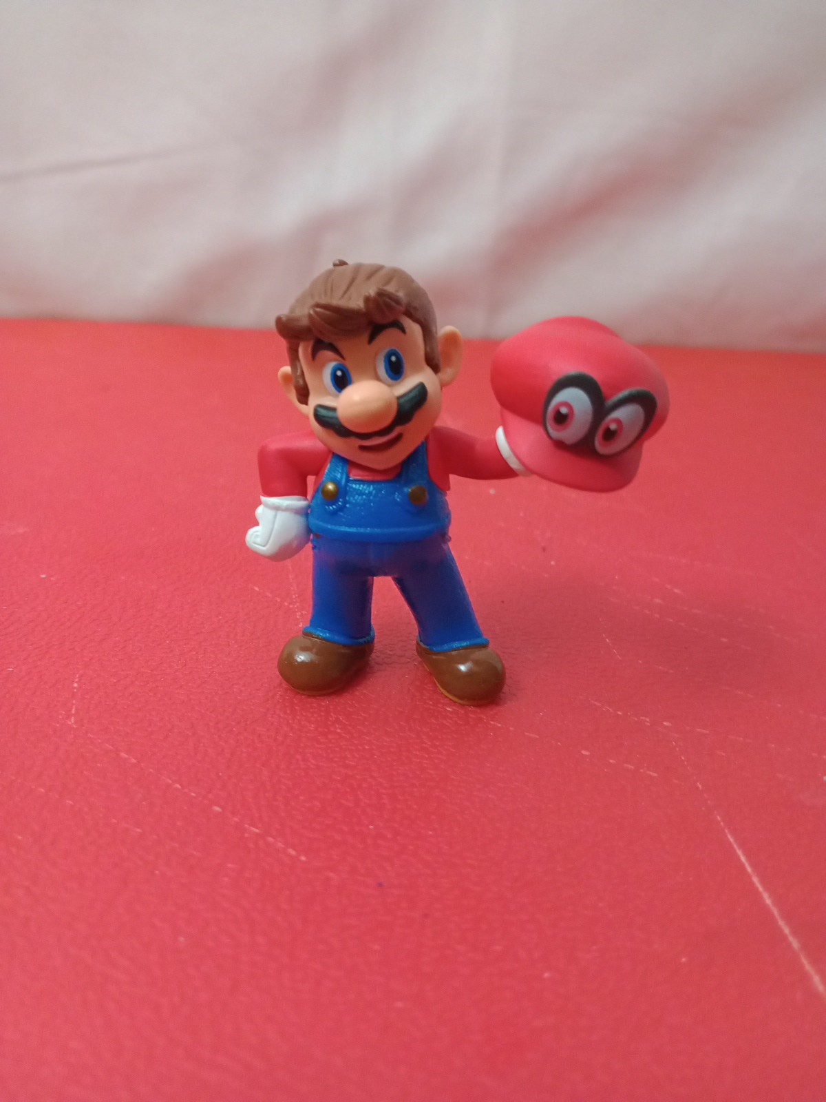 Modellino Jakks Pacific World of Nintendo 2,5" Mario con cappellino (tenuta)