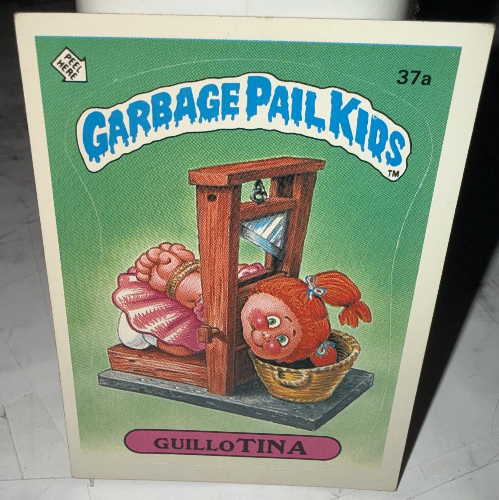 Adesivo vintage 1985 Topps Garbage Pail Kids Card 37a ghigliottina premio retro