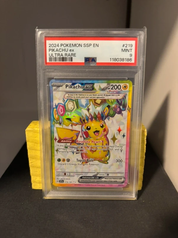 Pikachu 219 Surging Sparks PSA 9