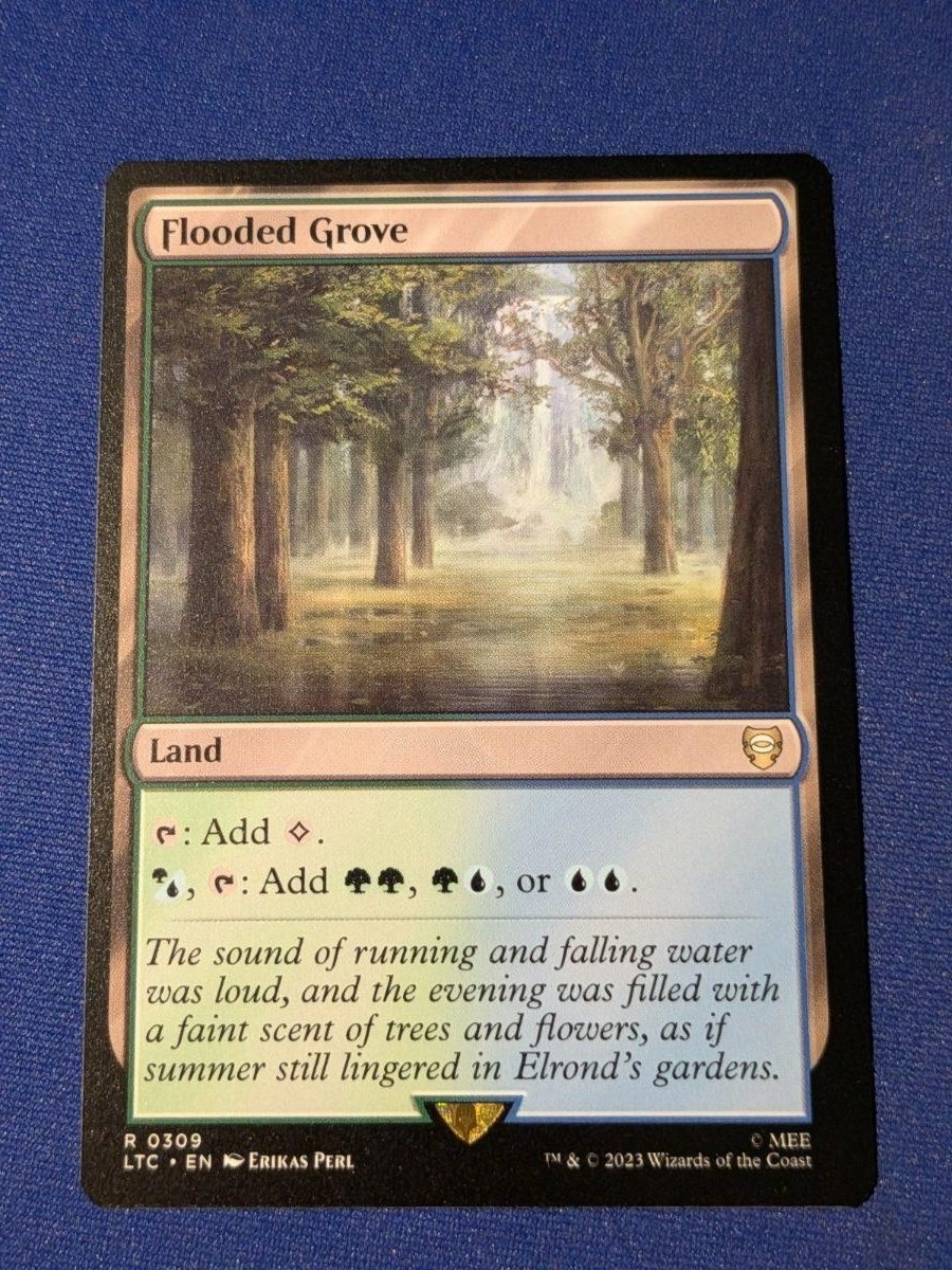 Flooded Grove Tales of Middle-earth Commander #309 quasi nuovo MTG