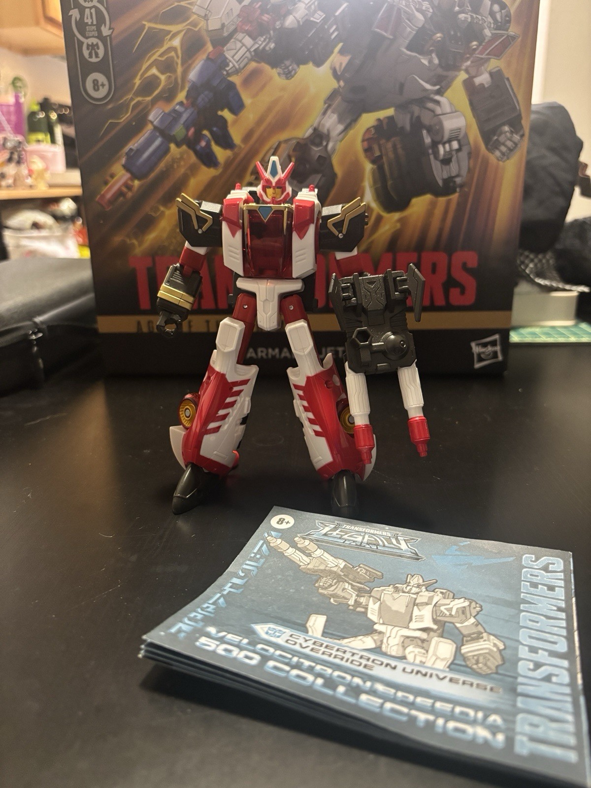 Transformers Legacy Velocitron Speedia 500 Voyager Class Override COMPLETO