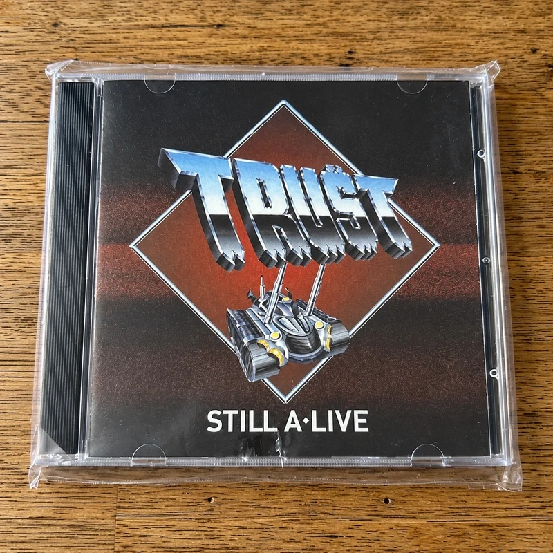 CD Trust – Still A’Live – Neuf sous blister
