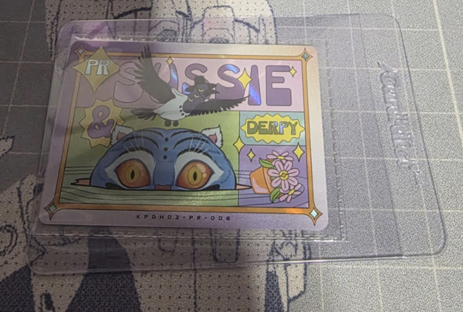 Carta promozionale NYCC 2026 Kayou Kpop Demon Hunters Sussie & Derpy