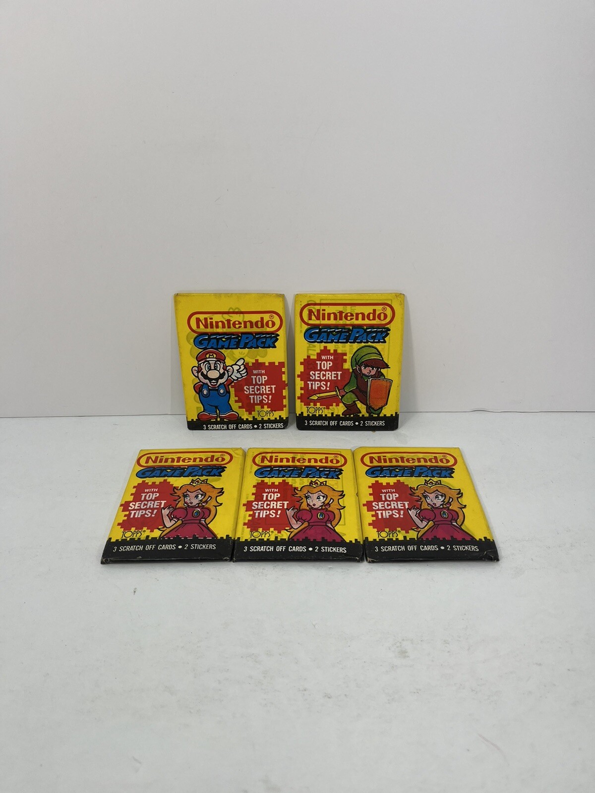 Lotto cera carte Topps Nintendo 1989 - confezione da 5 adesivi mai aperti NOS Mario Peach Link