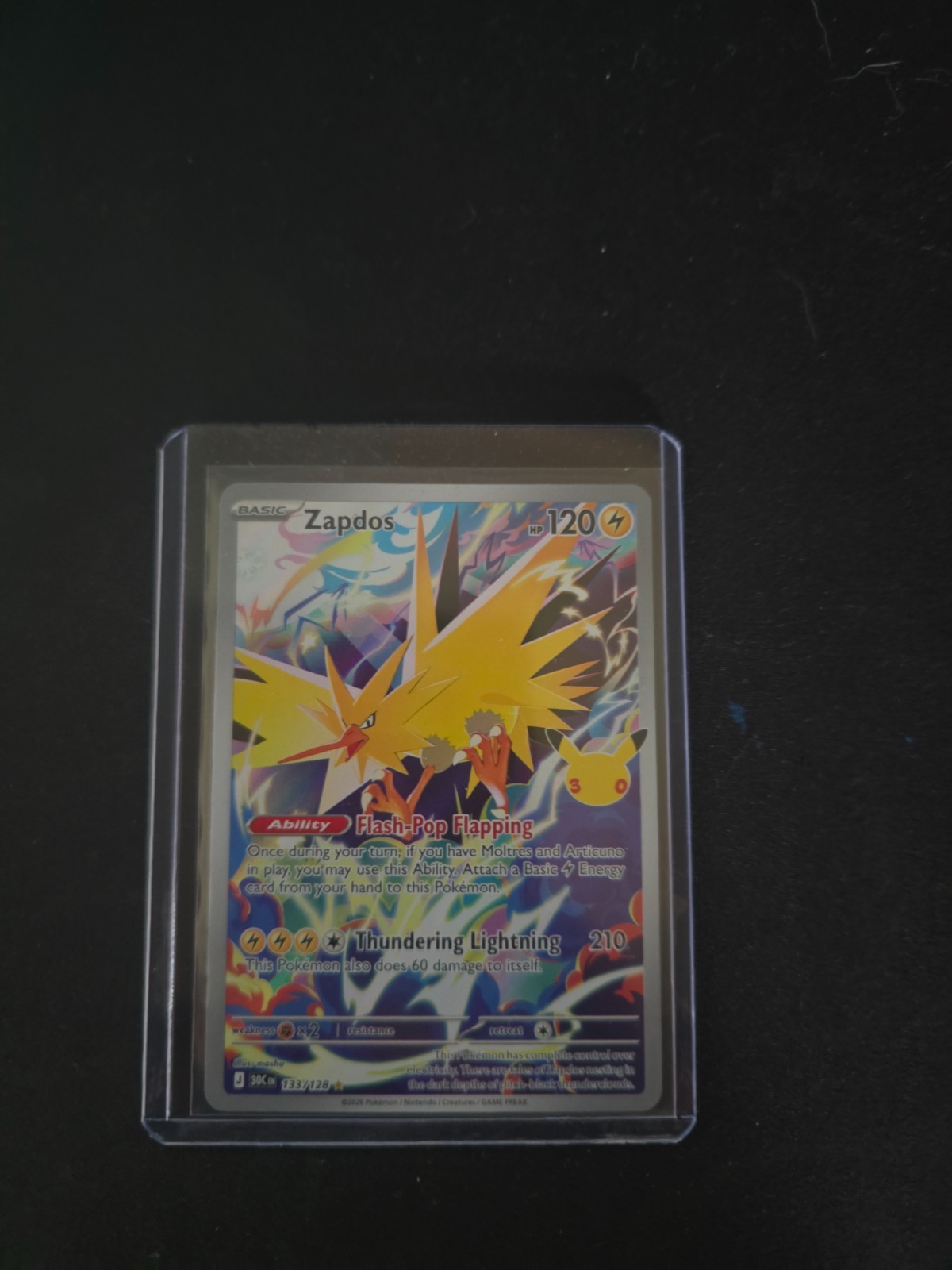 Zapdos 133/128 Me: Holo Celebrazione 30°