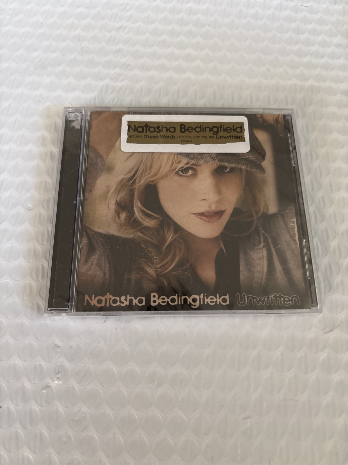 Natasha Bedingfield Unwritten CD SEALED (There Is A Drilled Hole)
