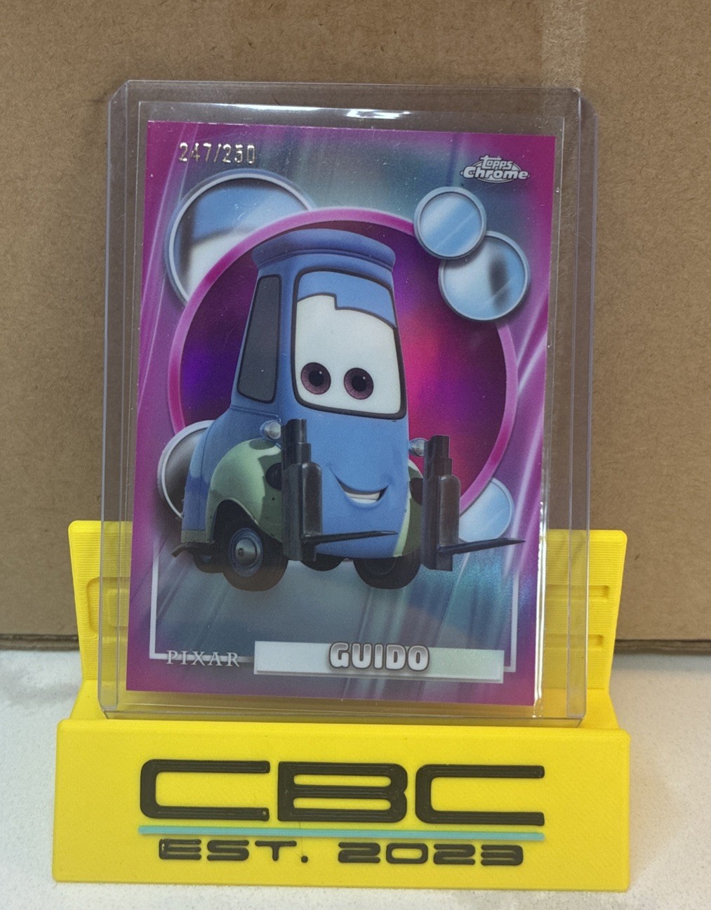 2026 Topps Chrome Disney Guido rifrattore rosa /250 AUTO SP
