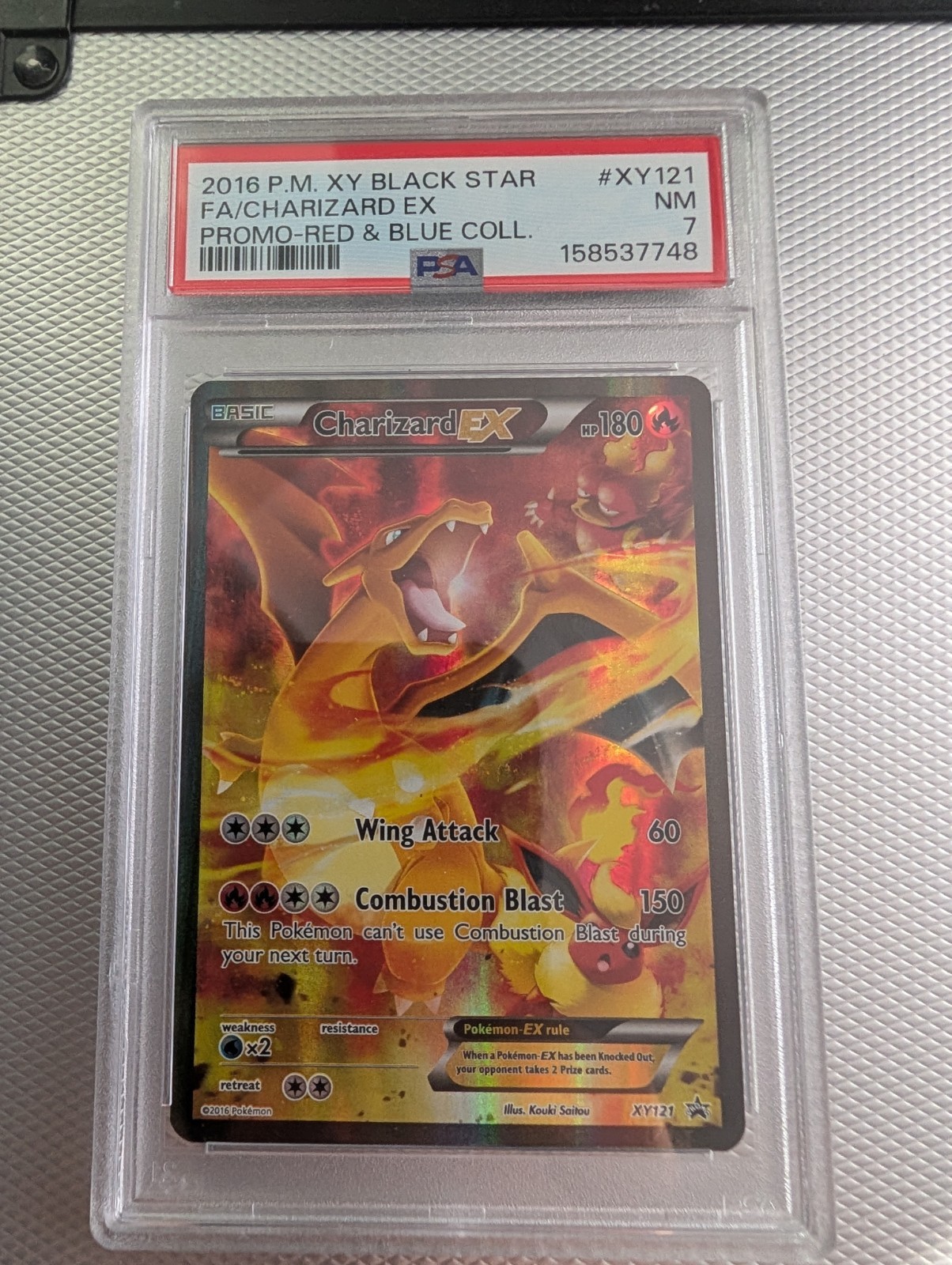 Pokemon - Charizard EX XY121 - Black Star Promo - PSA 7 