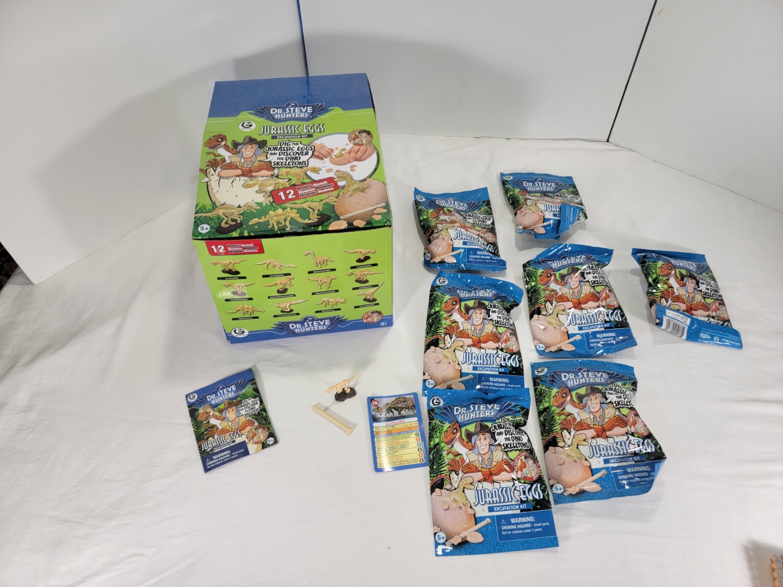 7 NUOVE borse cieche Geoworld Dr Steve Hunters Jurassic Eggs kit scavo con scatola