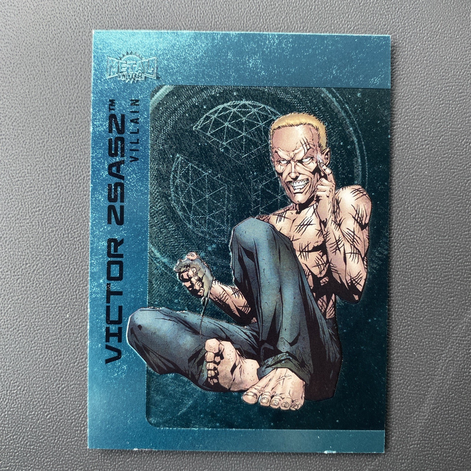2025 UD Skybox Metal Universe Batman- Aqua FX Victor Zsasz # 103 