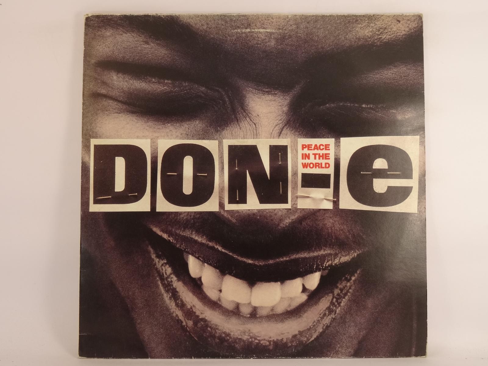 DON-E PEACE IN THE WORLD (300) 4 Track 12" Single including Picture Sleeve FOURT