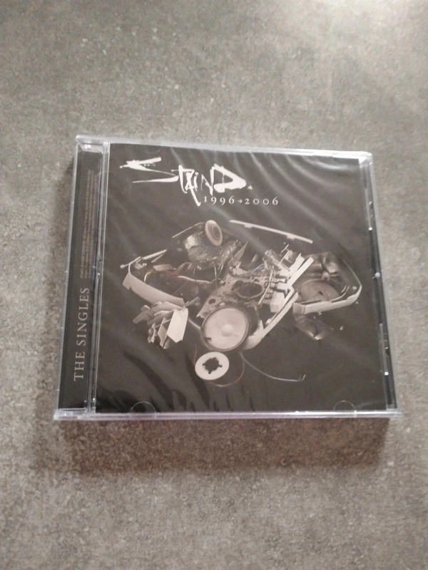 Album the singles neuf scellé