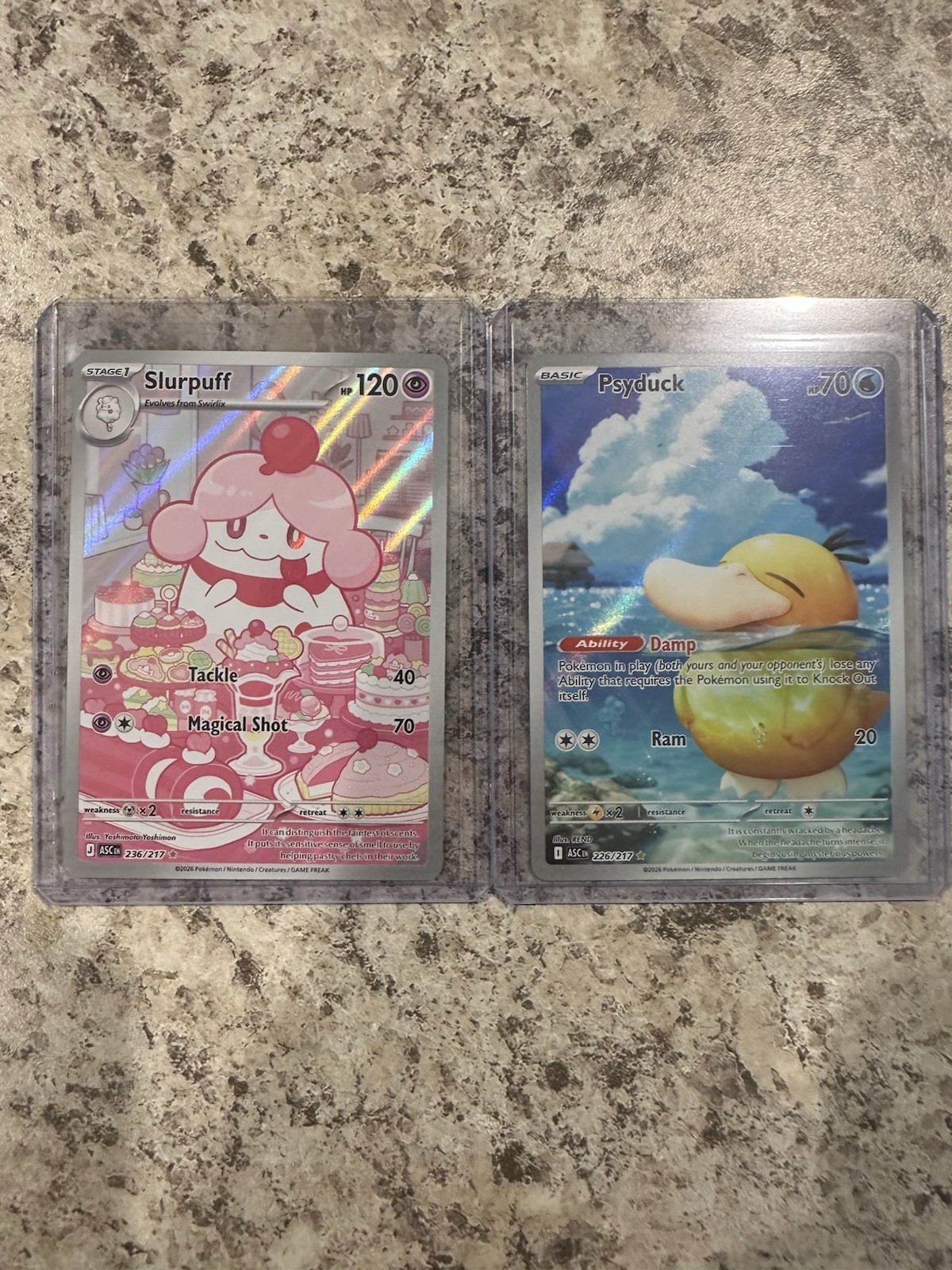 Carte Slurpuff e Psyduck Ascese Hero’s nuove fuori confezione