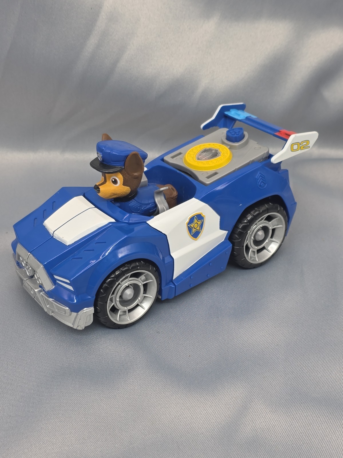 Spin Master Paw Patrol The Movie Chase Deluxe veicolo di trasformazione con personaggio 