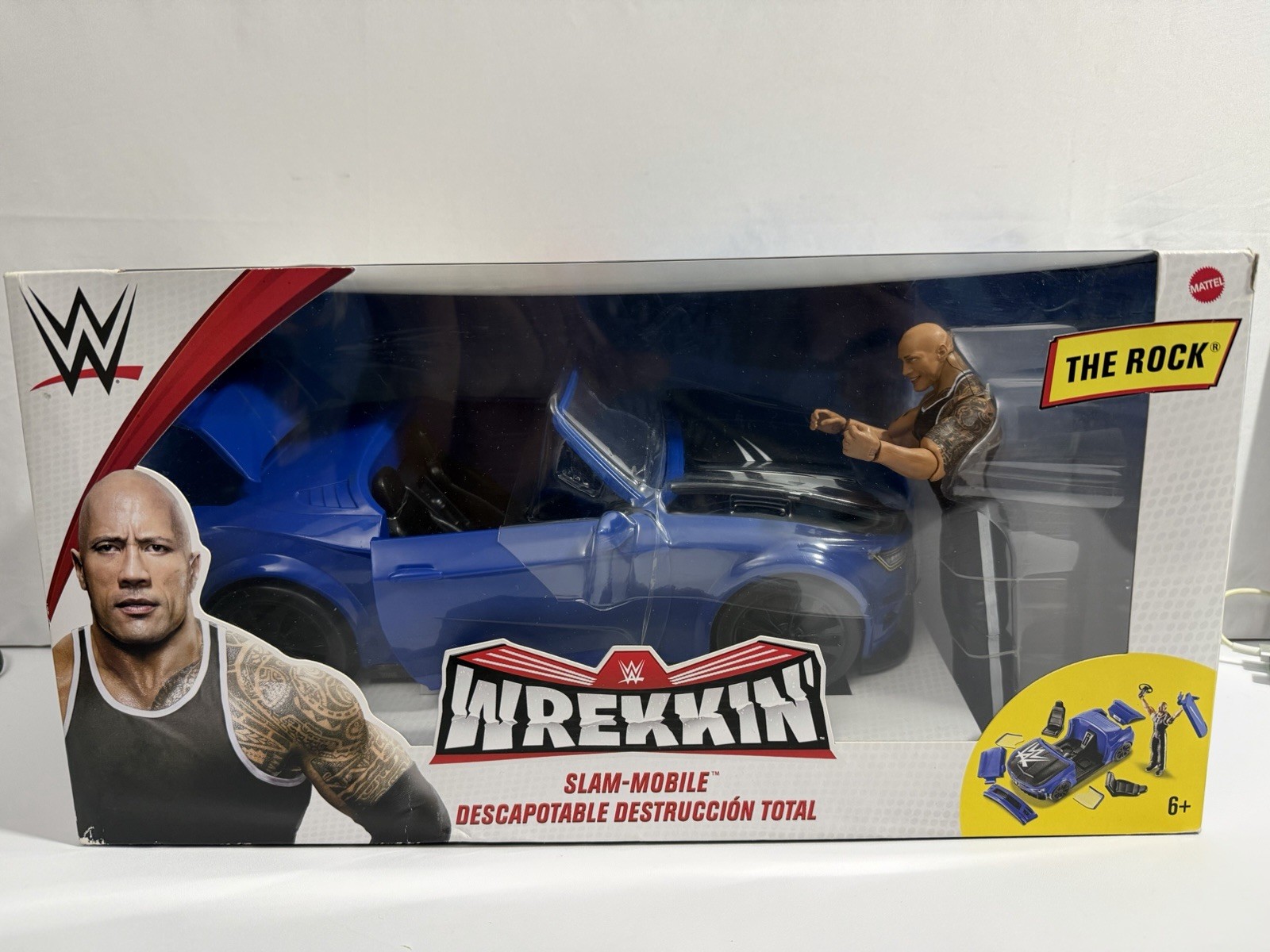 WWE WREKKIN Slam Mobile Playset The Rock Breakable Crash auto convertibile blu