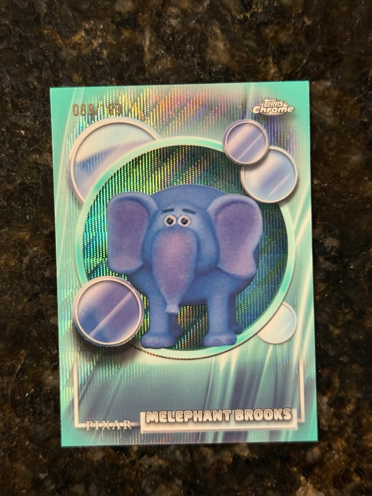 2026 Topps Chrome Disney Melephant Brooks rifrattore onda acquatica /199