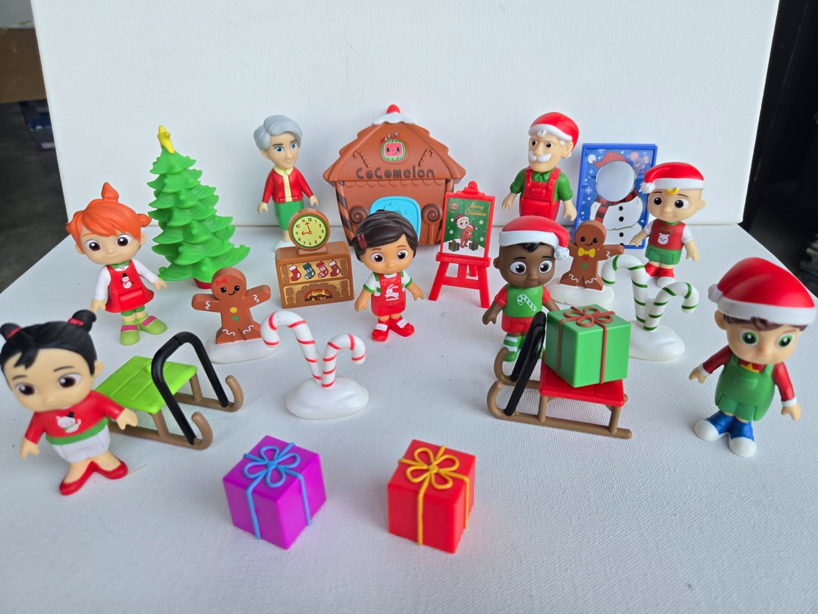 CoComelon Christmas Holiday Plastic Figure Set w/ Sled, Tree, Gifts, Gingerbread