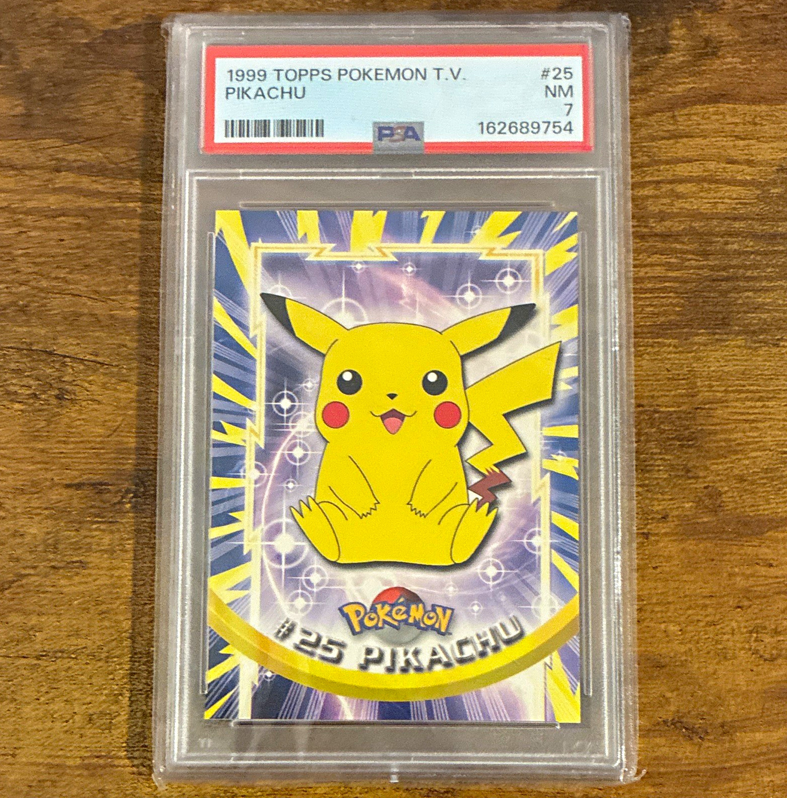 Topps 1999 Pokémon T.V. Pikachu #25 PSA 7 gradi carta non sportiva inglese