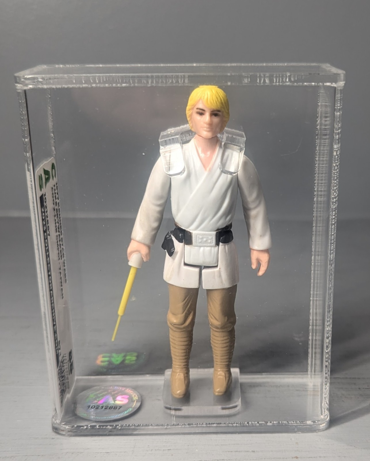 action figure vintage Luke Skywalker 1977 Kenner Star Wars CAS grado 85 bionda