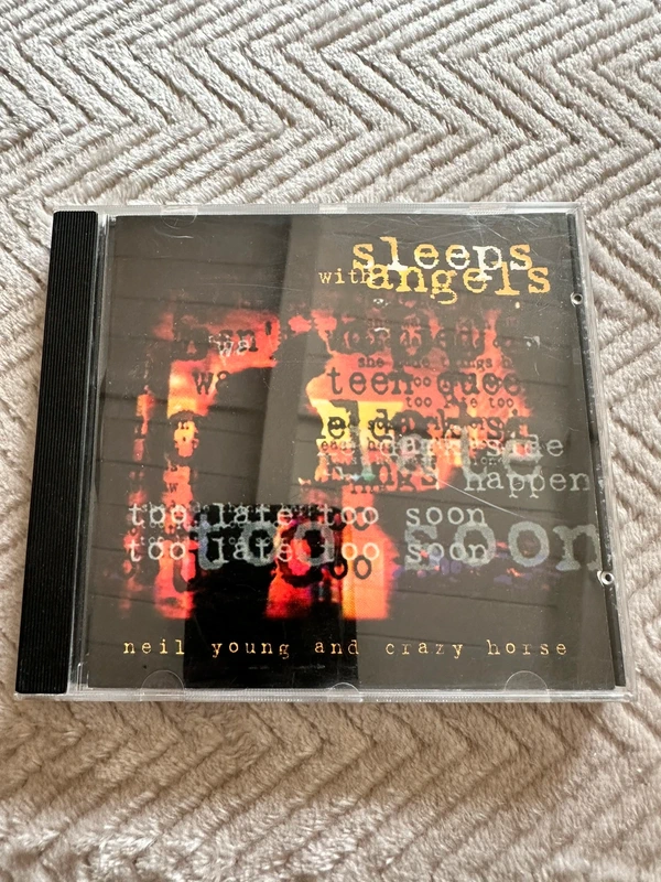 sleeps with angels - CD