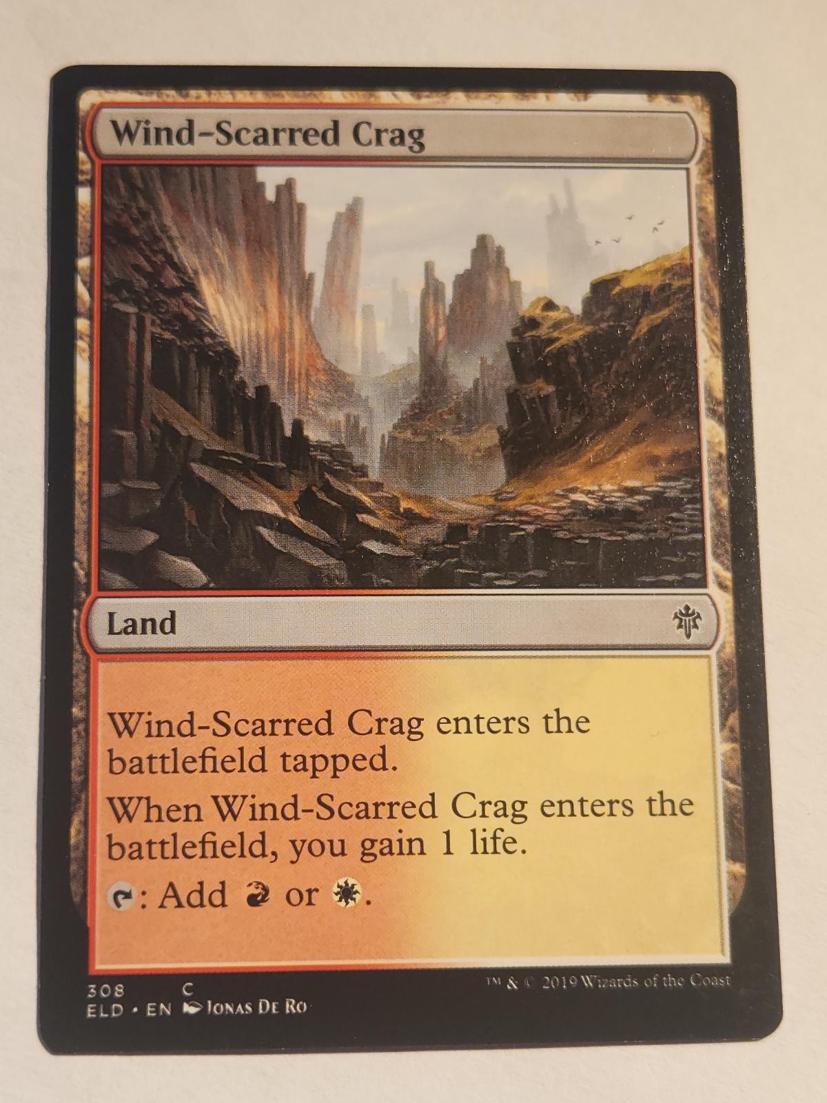 Wind-Scarred Crag 308 Trono di Eldraine Magic: The Gathering LP comune