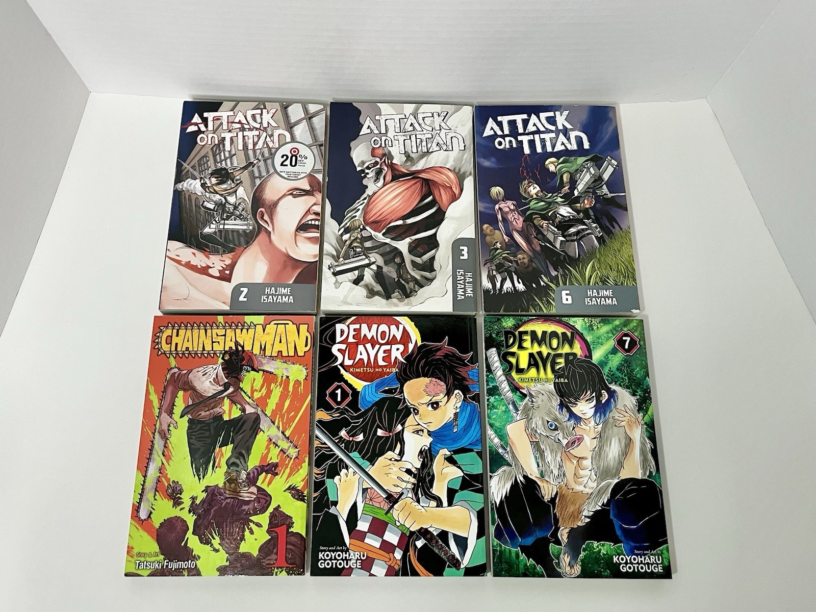 Lotto misto manga anime Attack on Titan motosega uomo demon slayer fumetto